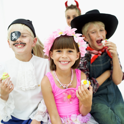 Picture of four children dressed up in themed costumes for a role playing activity - KalliKids articles