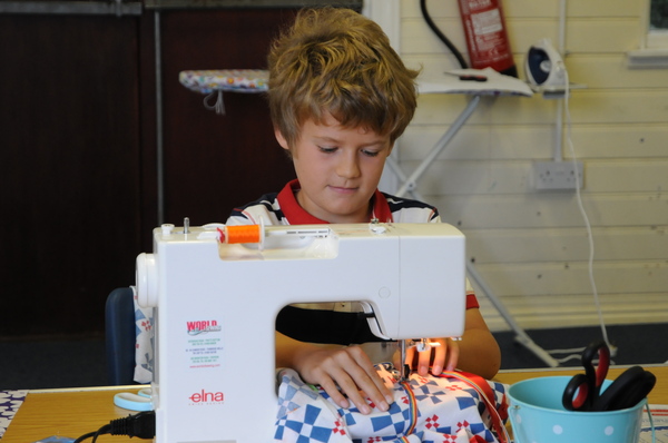 Made and Making Boy sewing